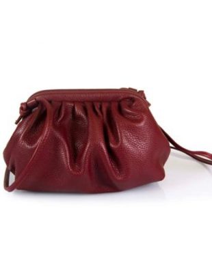 Udara Clutch, in genuine dollar leather. Magnetic opening.