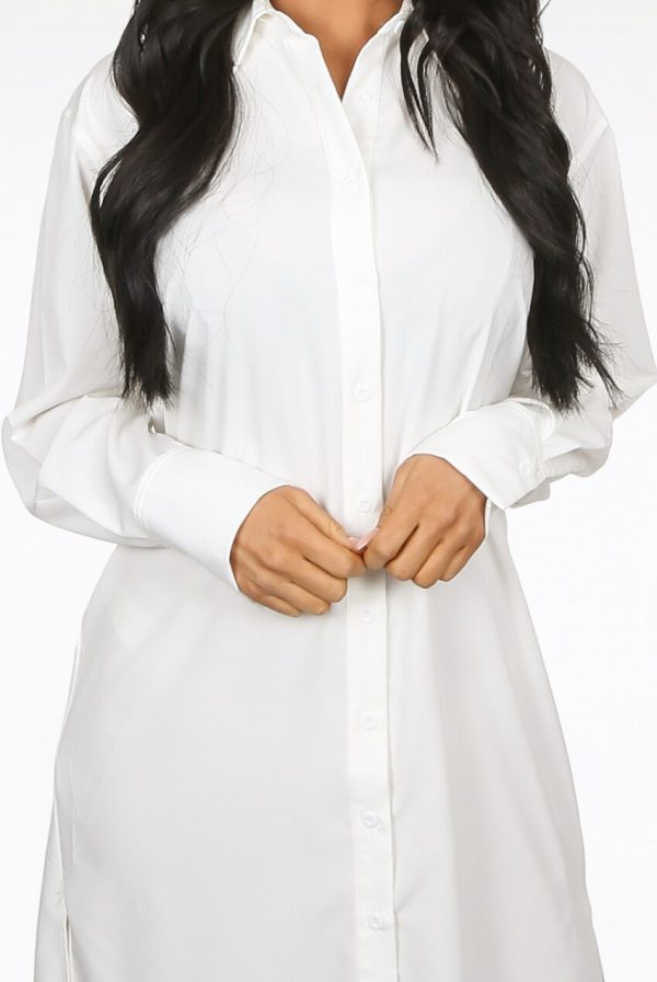 White side slit button up long sleeve shirt dress.