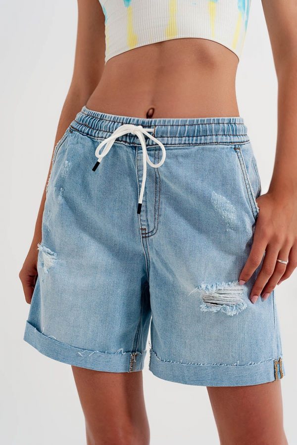 Denim shorts with elastic waist in wash blue.