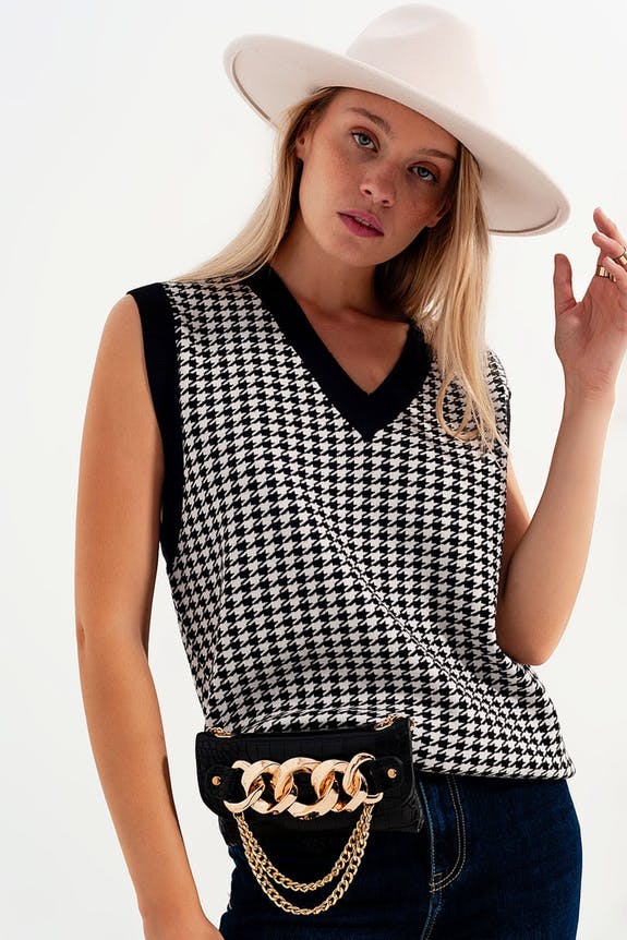Houndstooth vest in with contrast tipping black.